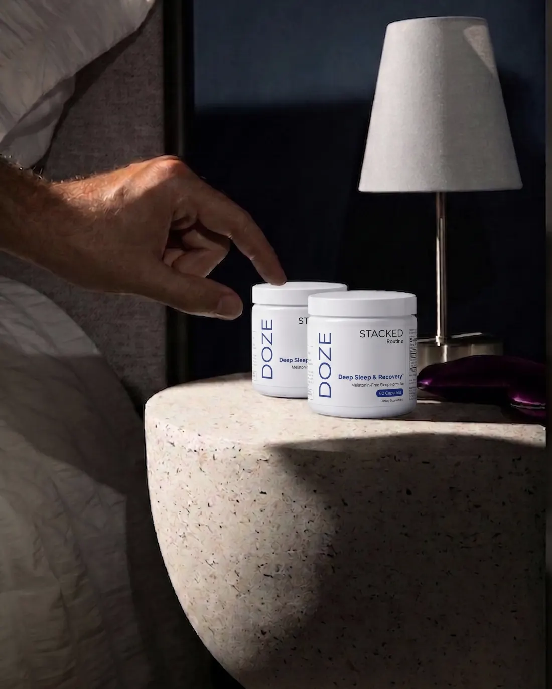 DOZE bottle on nightstand, engineered for men